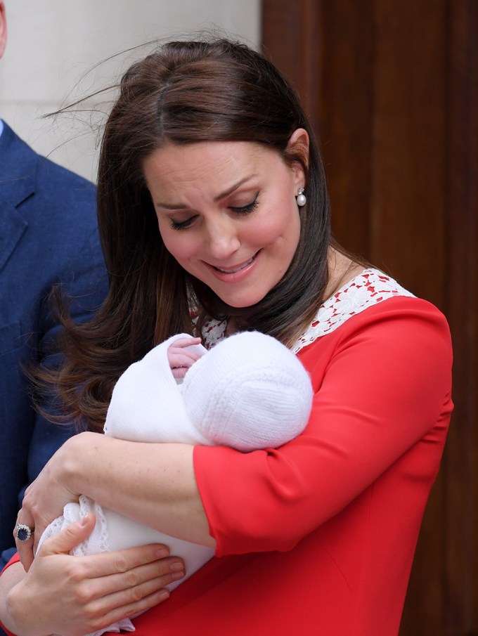 Kate Middleton looks at Prince William outside hospital