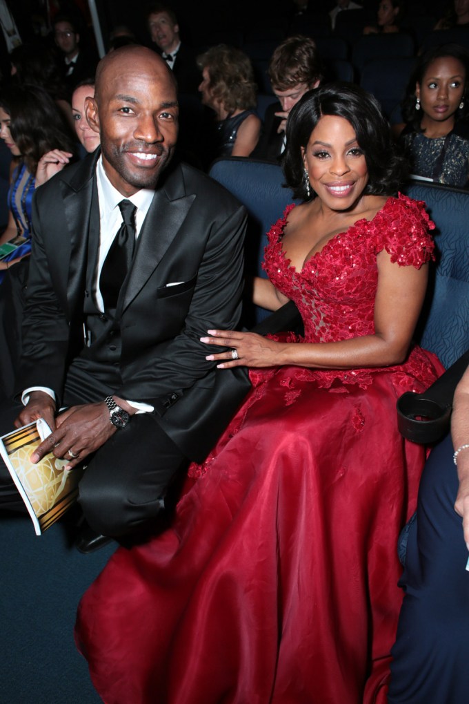 Jay Tucker and Niecy Nash at the 67th Primetime Emmy Awards