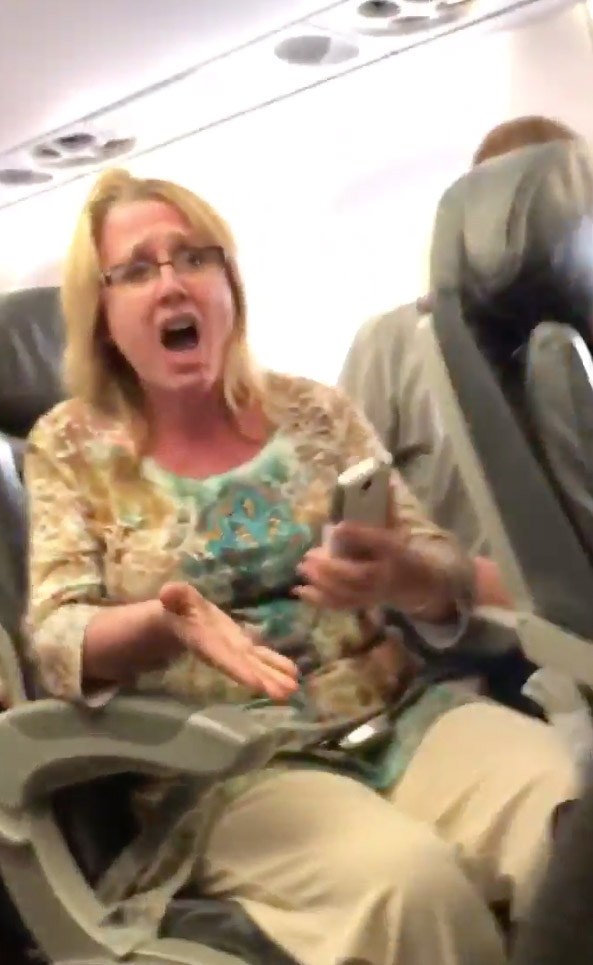 United-Airlines-Shocking-Video-Passenger-Bloodied-Disoriented-10