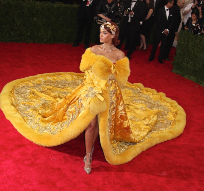 Rihanna Floats On The Red Carpet In Majestic Gold Gown