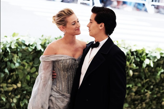 Lili Reinhart and Cole Sprouse smile at each other