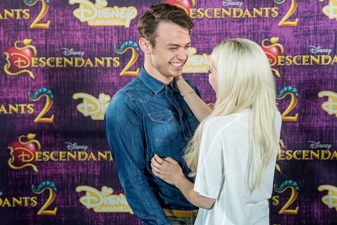Dove Cameron and Thomas Doherty goof around at the ‘Descendants 2’ film photocall