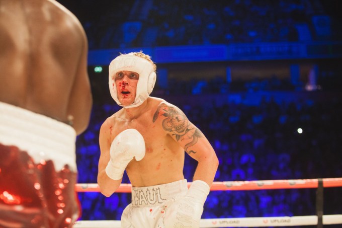 Jake Paul bloody in a boxing match