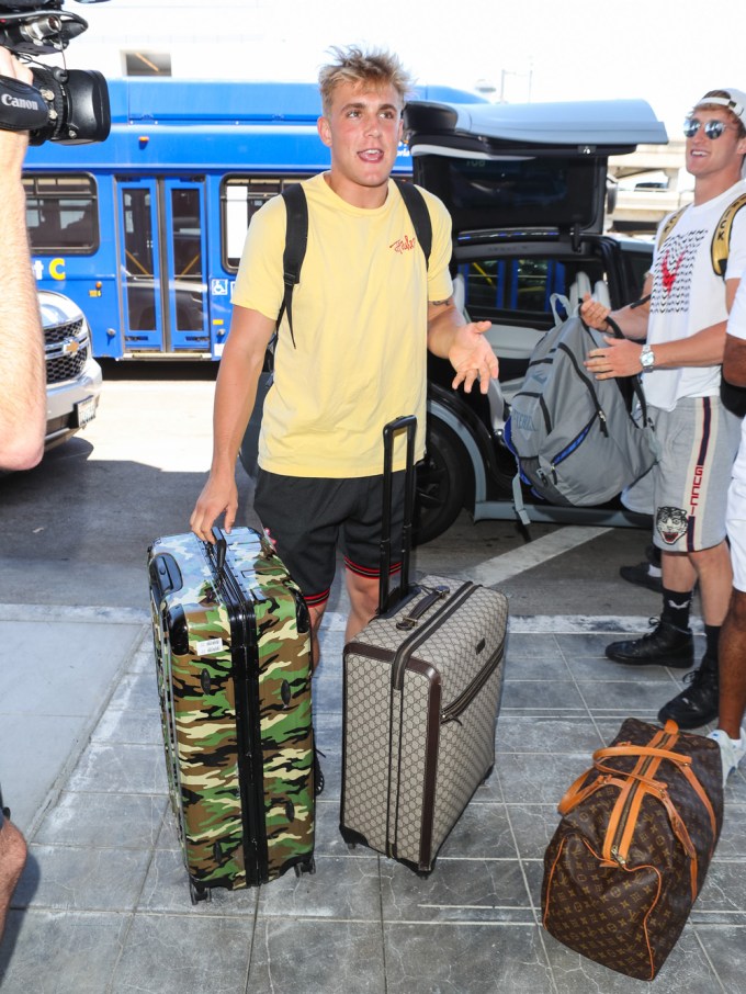 Jake Paul at the airport with lots of luggage