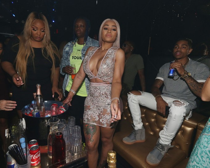 Blac Chyna poses in a club with Mechie