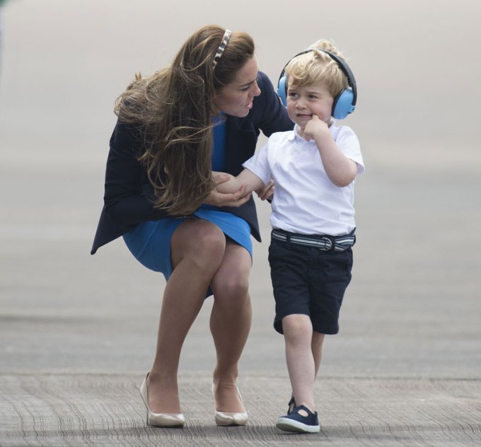 Prince George and his mom walking