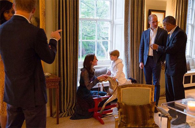 Prince George with his family during a meeting with Barack Obama