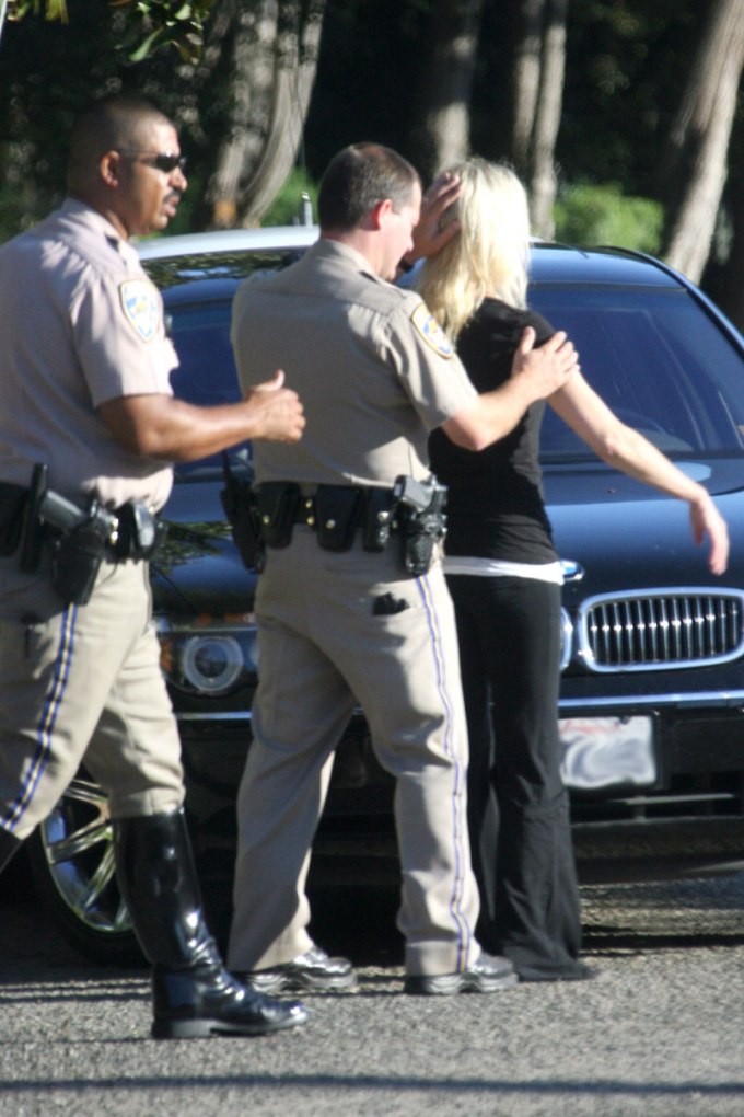 Heather Locklear being taken into custody