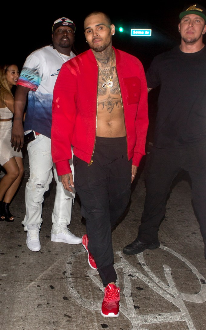 Chris Brown Goes Shirtless Under A Red Jacket