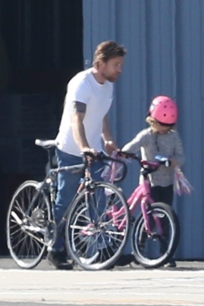 Ewan McGregor takes daughter Anouk for a bike ride at the Santa Monica airport