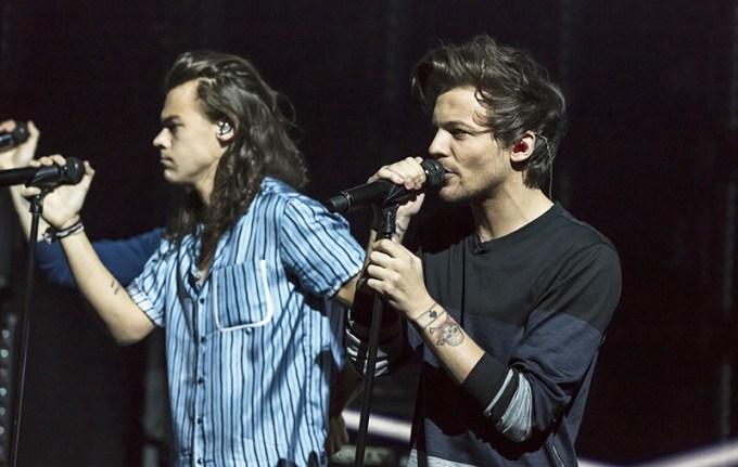 Harry Styles & Louis Tomlinson Hit The Stage In London