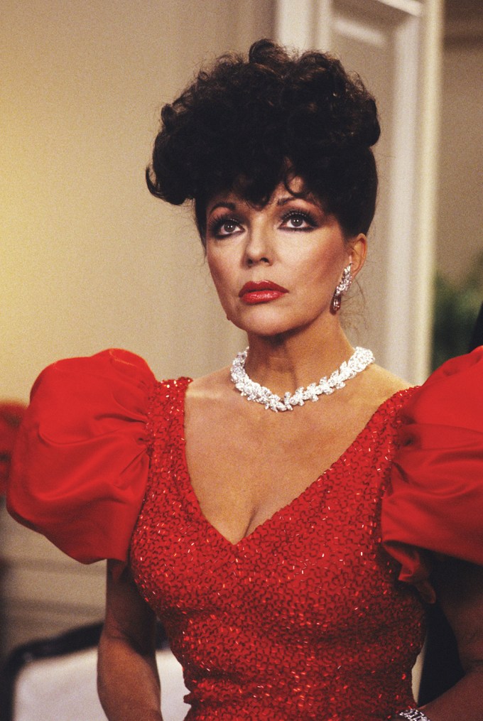 Joan Collins Is A Vision In Red