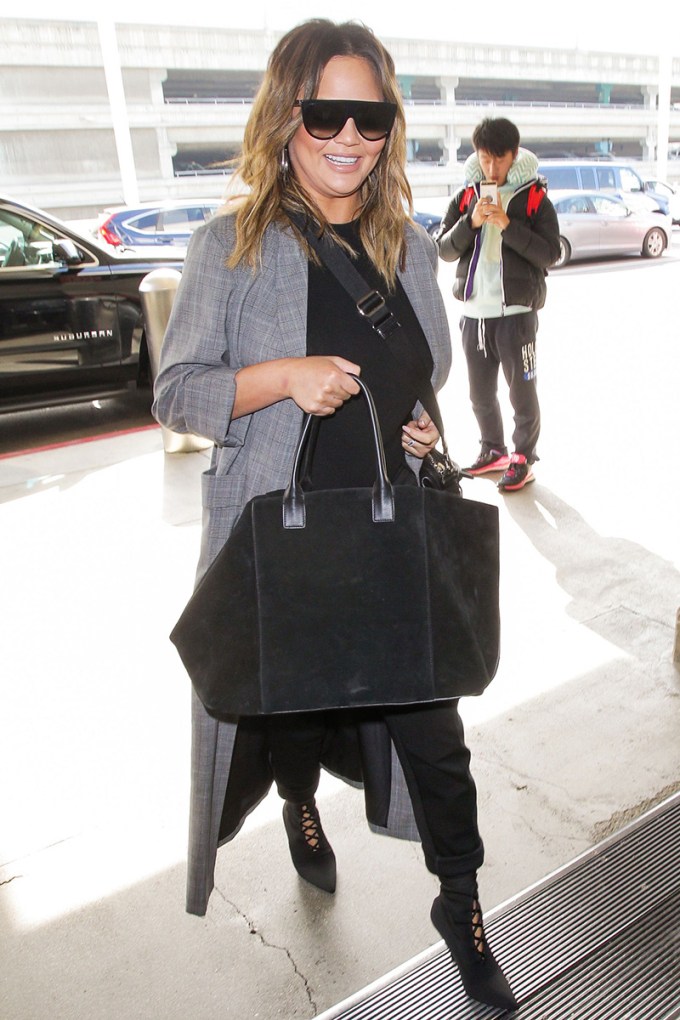 Chrissy Teigen Hiding Her Bump All These Weeks In Fabulous Outfits