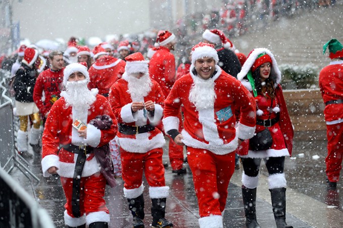 Santa Con: Pics & Videos Of People Dressing Up As Kris Kringle During 1st NY Snowfall
