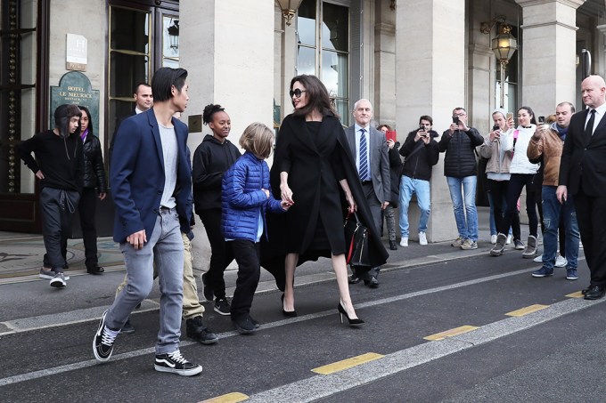 Angelina Jolie and her children leave the Meurice Hotel heading to the Louvre