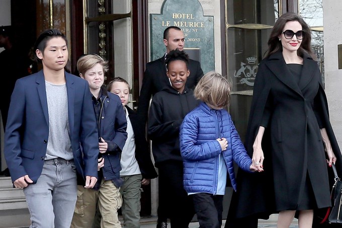 Angelina Jolie and her children leave the Meurice Hotel heading to the Louvre