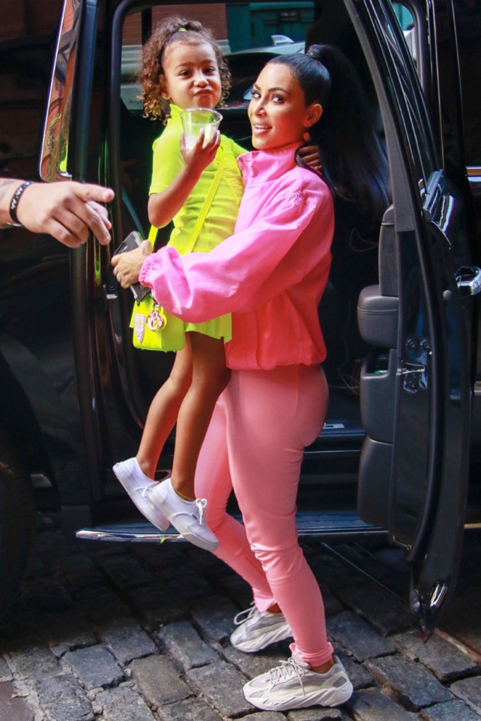 Kim Kardashian and North West outside a car in New York