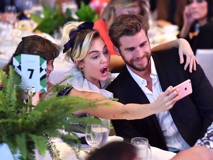 Miley Cyrus & Liam Hemsworth Take A Selfie