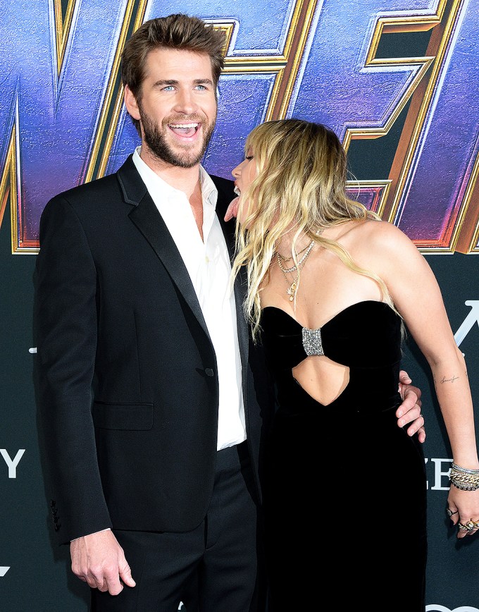 Miley Cyrus & Liam Hemsworth Goofing Off On Red Carpet