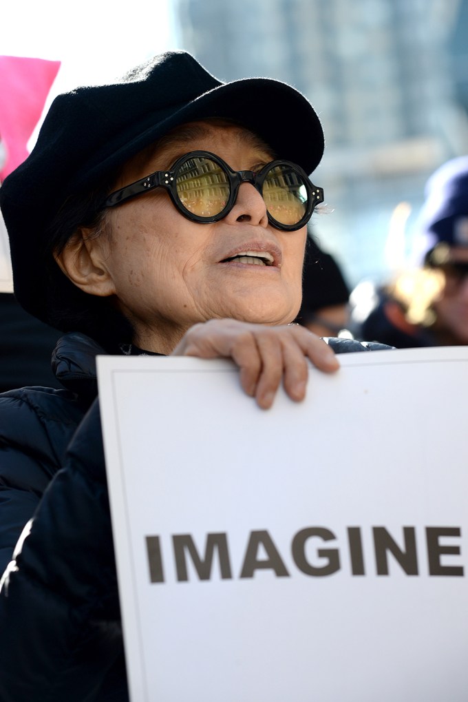 Yoko Ono Holds An ‘Imagine’ Sign