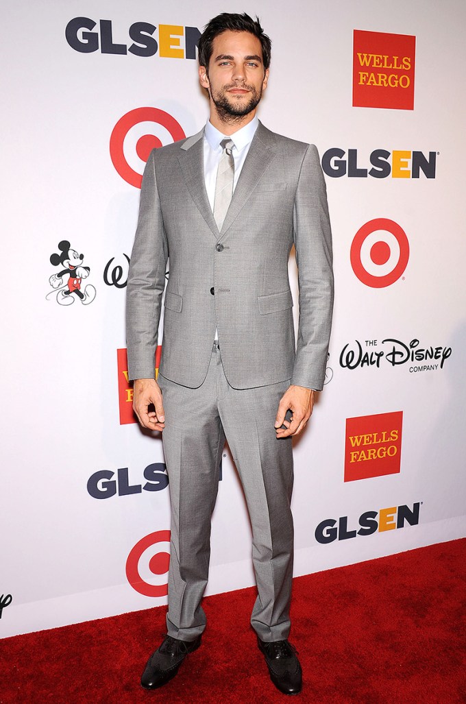 Brant Daugherty in a silver suit