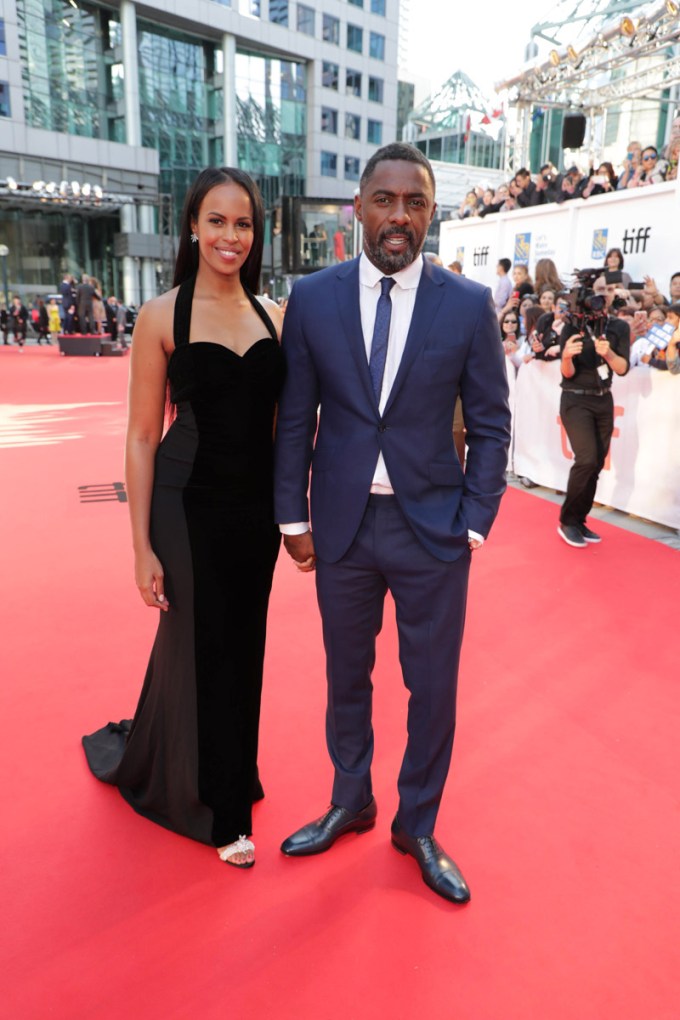 Idris Elba & Sabrina Dhowre at a movie premiere