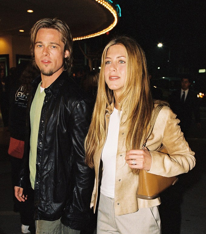 Jennifer Aniston & Brad Pitt Hold Hands At An Event