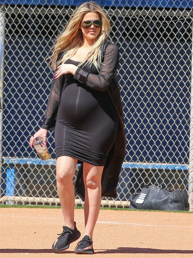 Pregnant Khloe Kardashian Flaunts Baby Bump During Family Softball Game