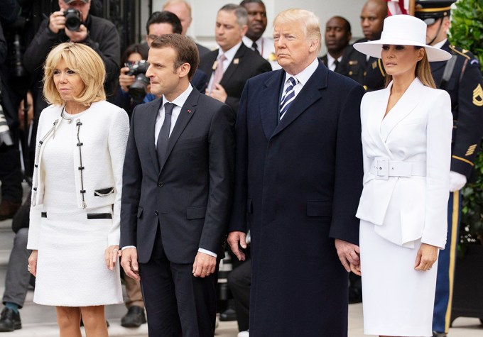 Donald & Melania Trump Awkwardly Hold Hands