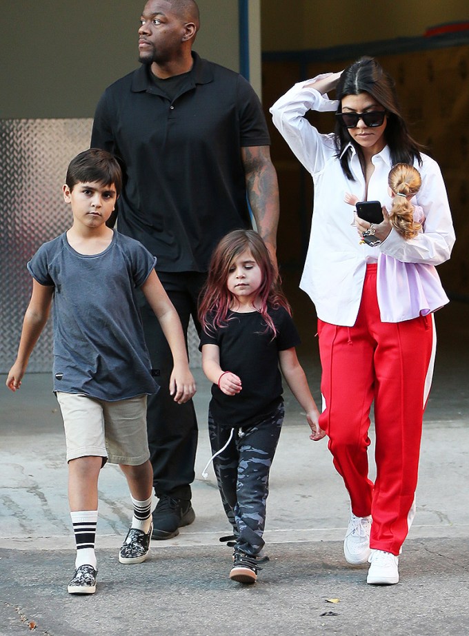 Penelope Disick out with mom Kourtney and brother Mason