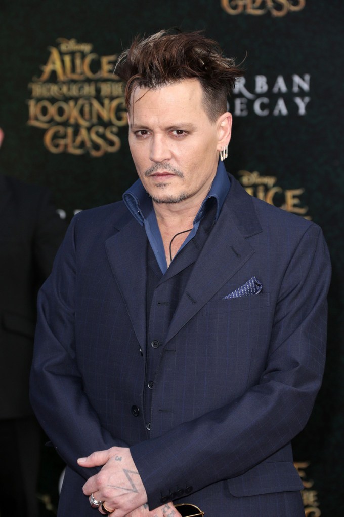 Johnny Depp gives a serious look at a premiere