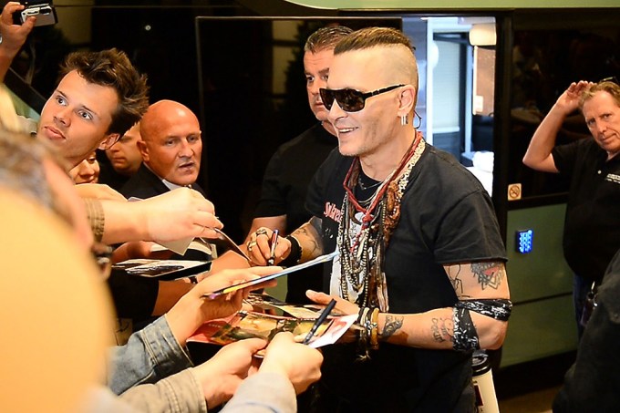 Johnny Depp signs autographs