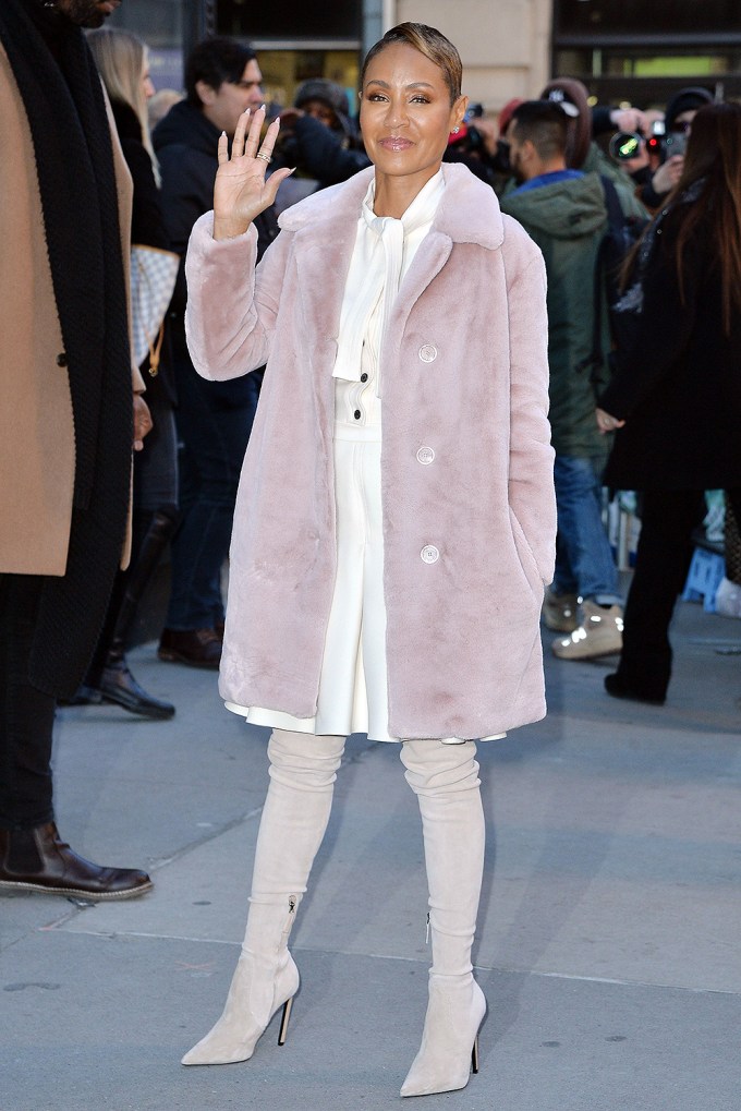 Jada Pinkett-Smith Wearing A Pink Fur Coat And Thigh-High Boots