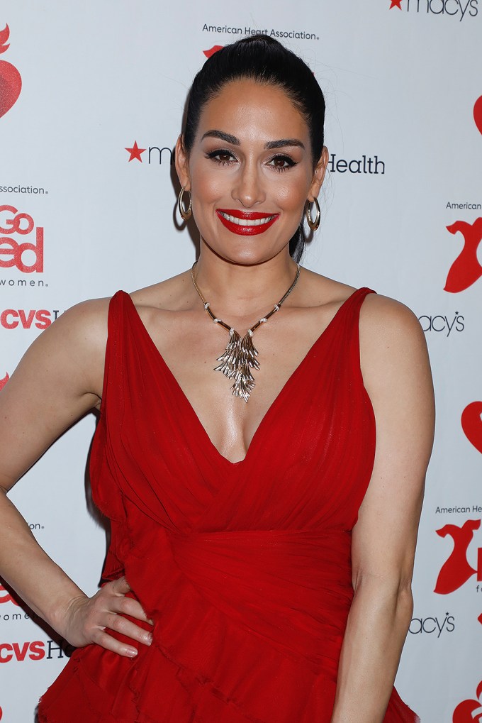 Nikki Bella in a red gown