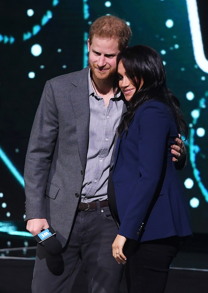 Prince Harry & Meghan Markle Get Cozy At WE Day