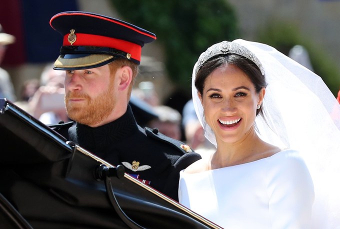 Prince Harry & Meghan Markle wave to onlookers