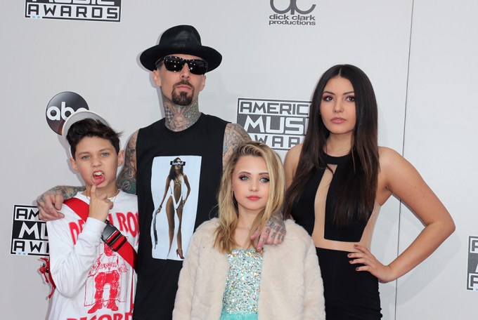 Travis Barker poses with his kids at the 2016 AMAs