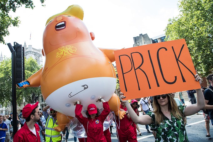 National Rally Against Trump’s Visit To London — See Photos Of The Trump Baby Blimp