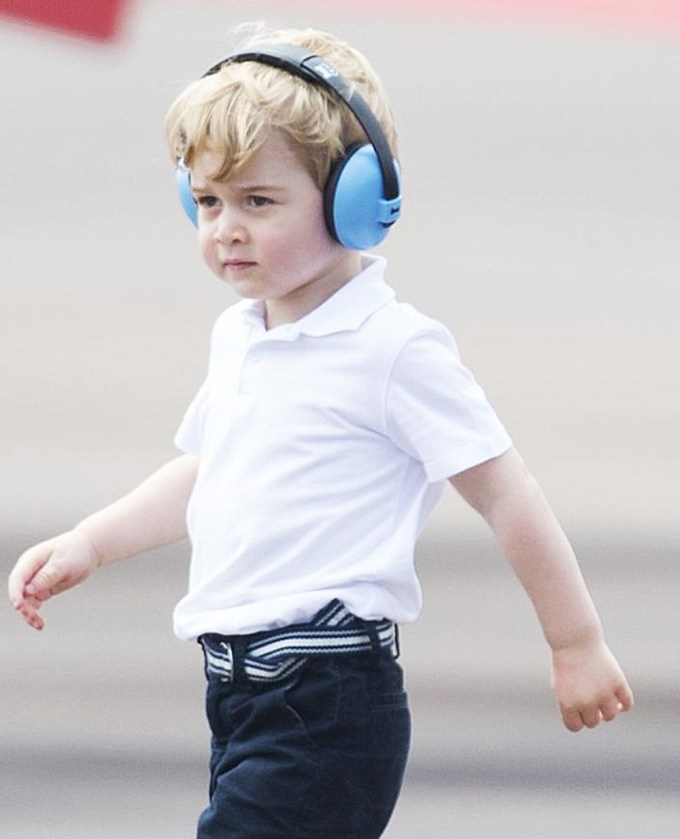 Prince George in noise-canceling headphones