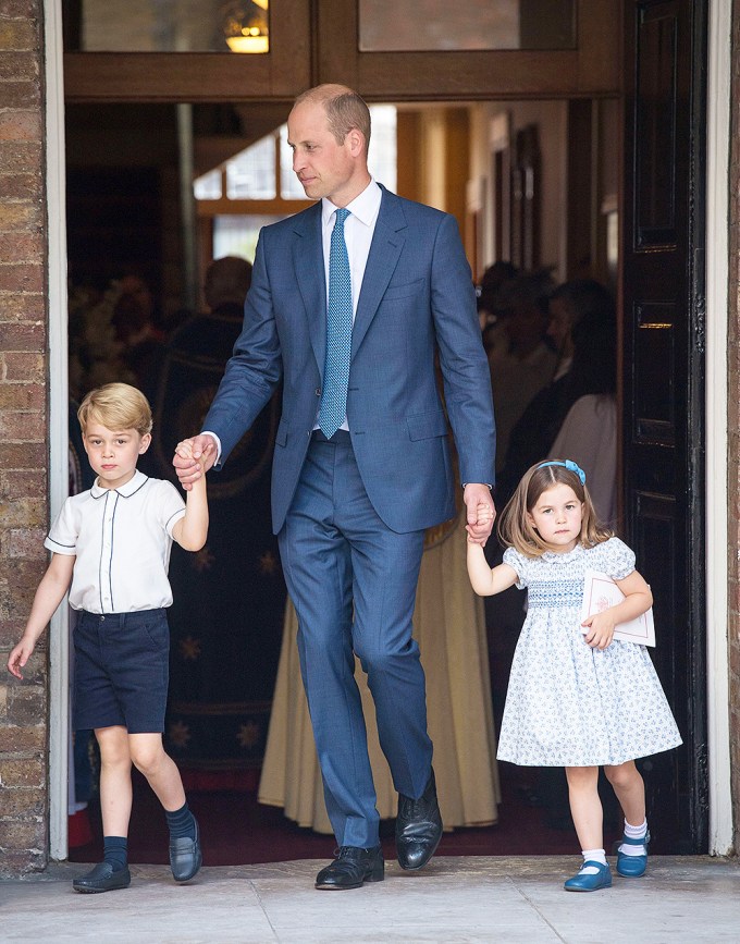 Prince George & Princess Charlotte hold dad, Prince William’s, hands