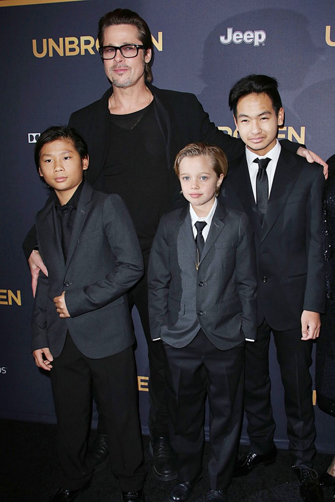 Brad Pitt With Maddox, Pax and Shiloh On A Red Carpet