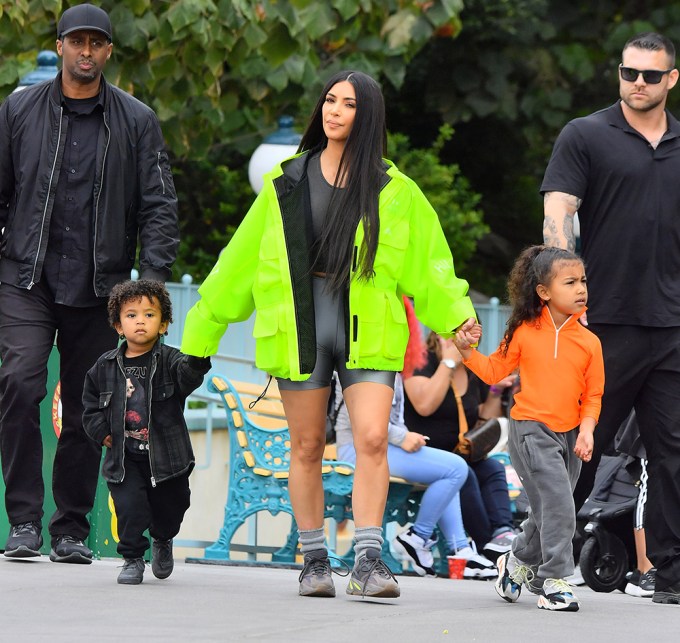 Kim enjoying a day at Disneyland with their kids in Anaheim
