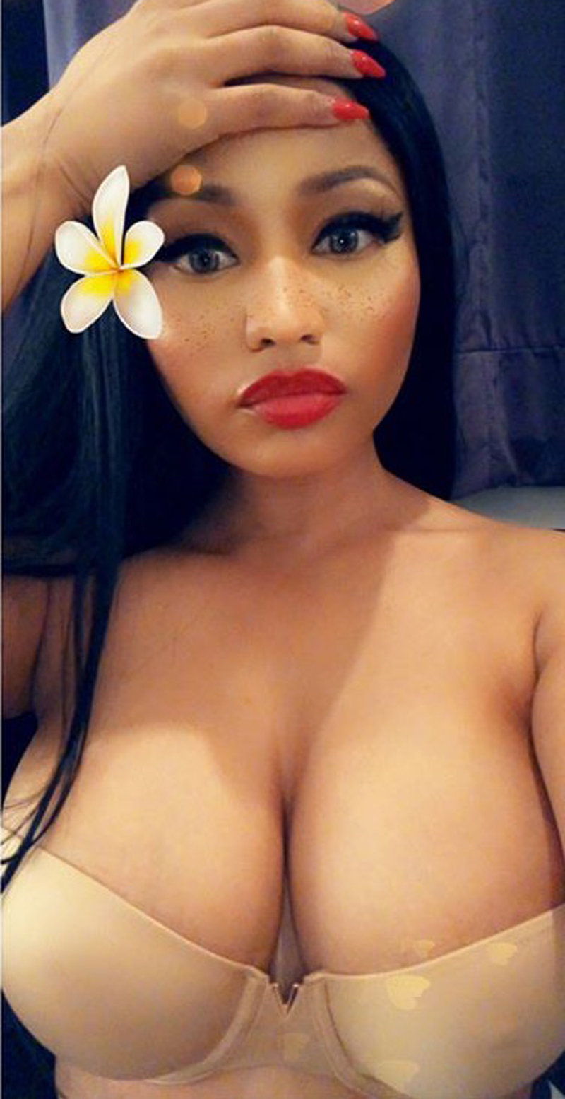 Braless Nicki Minaj is 99.9% boob in titillating cleavage close-up