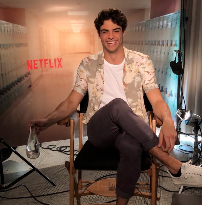 Noah Centineo smiles during an interview