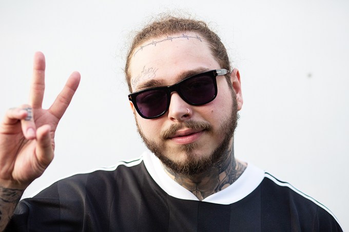 Post Malone Throws Up Deuces