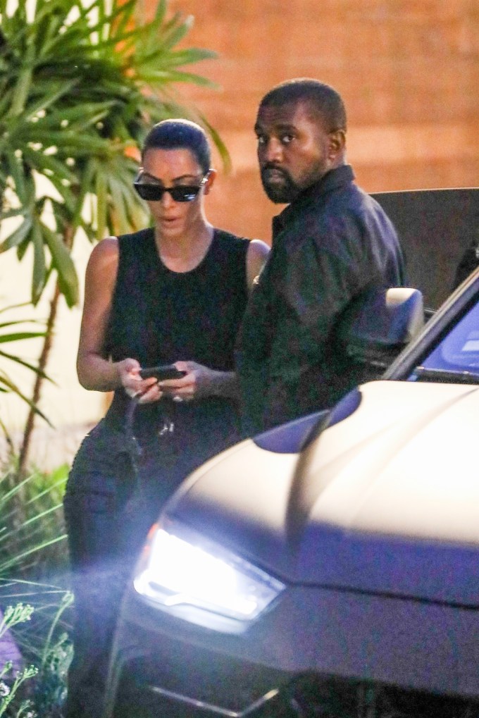 Kim Kardashian & Kanye West in matching black outfits