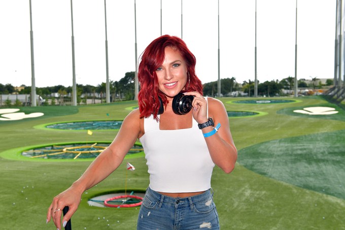 Sharna Burgess in a white tank top