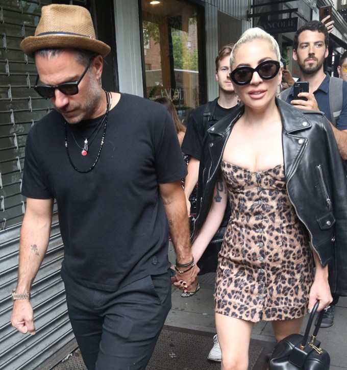 Lady Gaga & Christian Carino holding hands