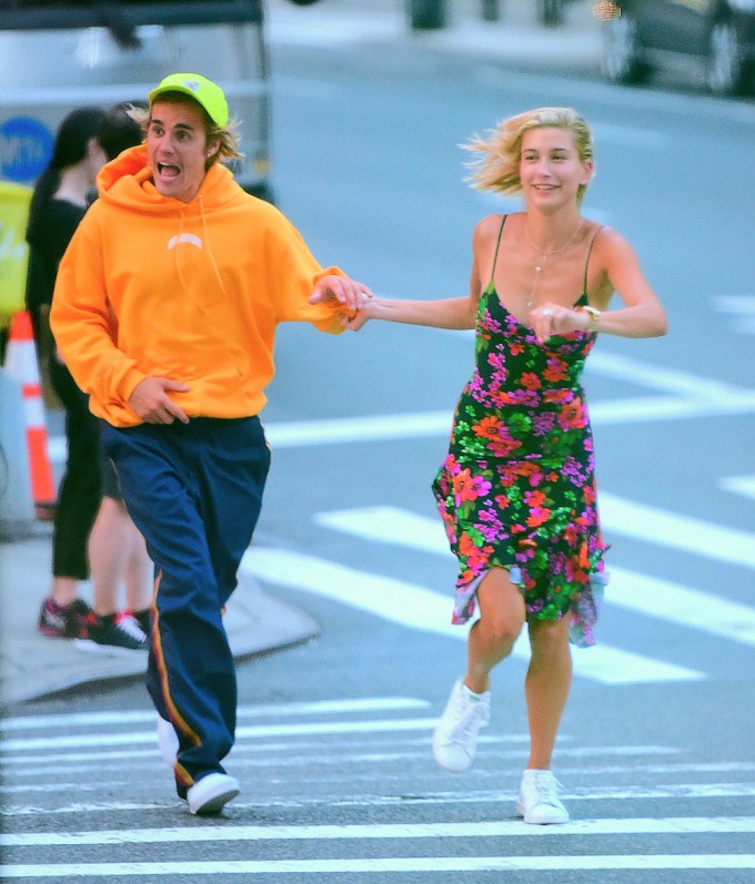 Justin Bieber & Hailey Baldwin Running Across The Street
