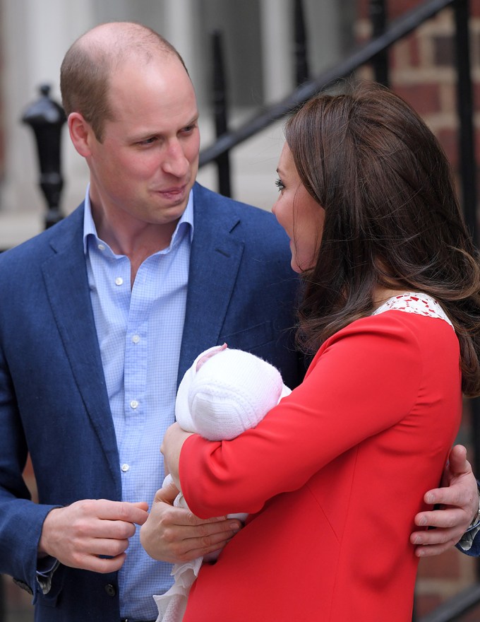 Prince William protectively puts his hand on Kate Middleton’s back